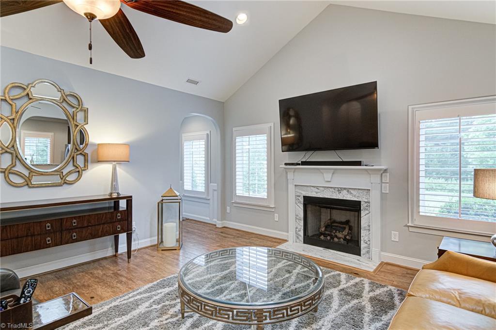 634 Nikyle Circle High Point, NC 27265 - Photo 4 of 32 The Great Room has a gas fireplace. Great space flexibility for your furniture needs. There are Plantation Shutter throughout the home. From the Great Room you look over a large common area for added privacy.