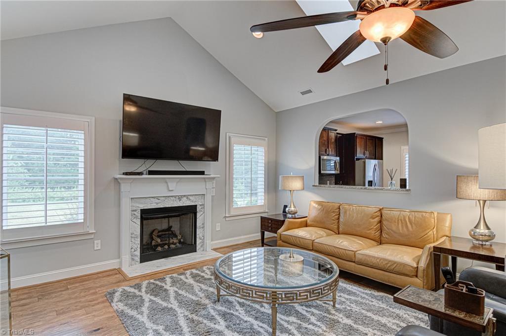 634 Nikyle Circle High Point, NC 27265 - Photo 6 of 32 The Great Room with beautiful view of the side yard. TV about the fireplace to stay.