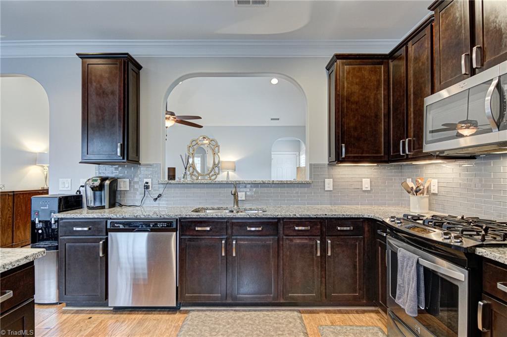 634 Nikyle Circle High Point, NC 27265 - Photo 8 of 32 The Kitchen, Dining Area and Great Room openness will be one of your favorite features of the home. This makes entertaining so much fun as everyone will be together.