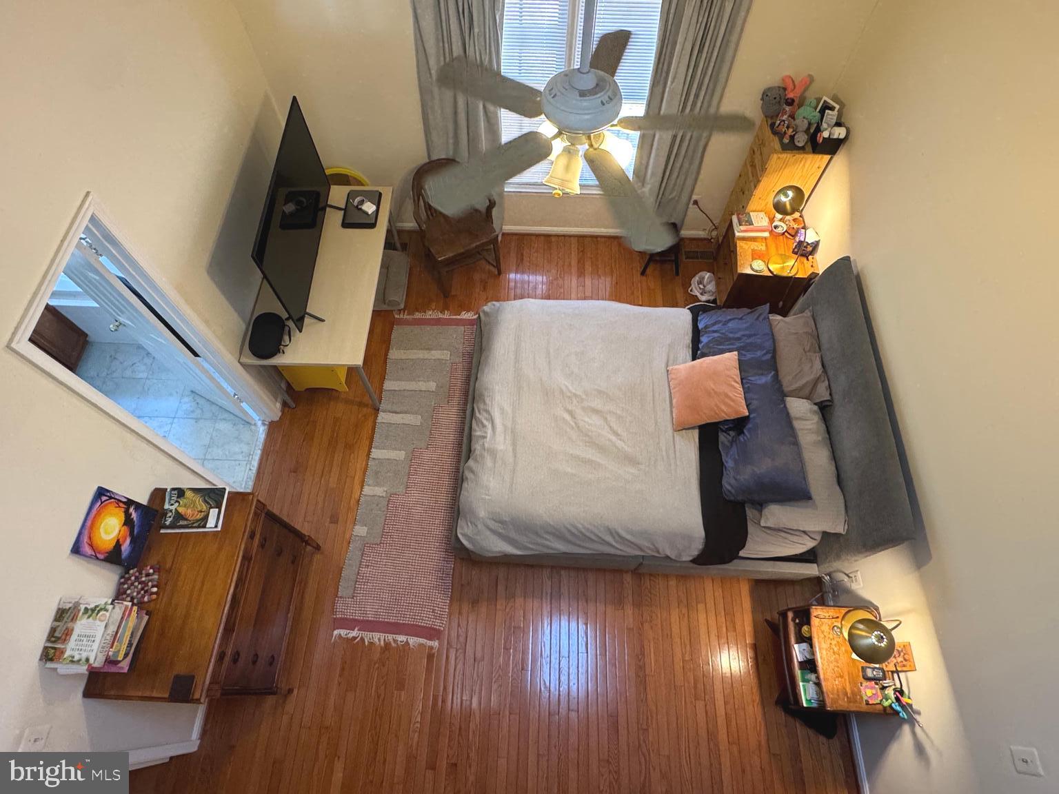 8732 Stone Hill Place Springfield, VA 22153 - Photo 17 of 28 wooden floor with view of living room