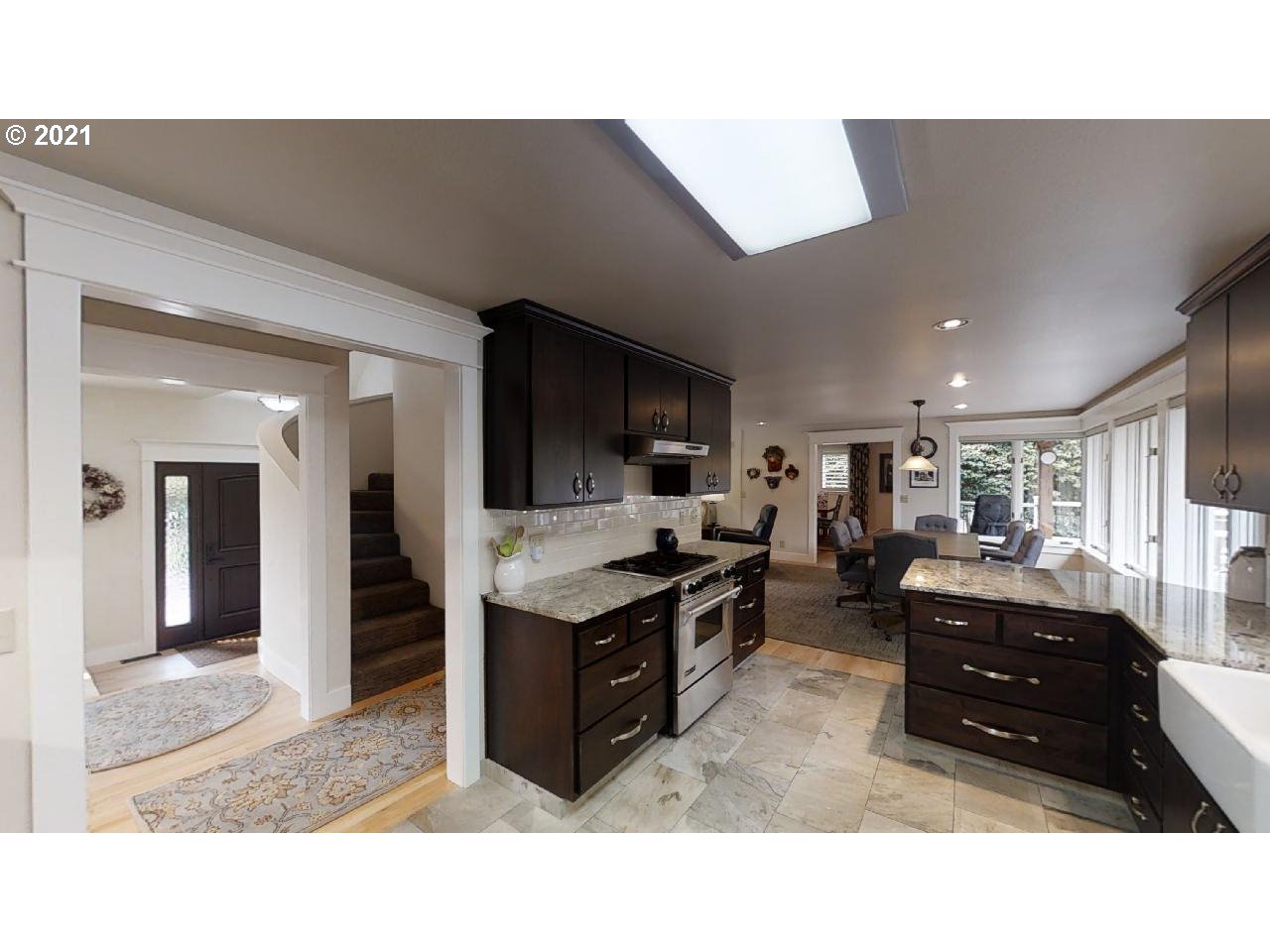 555 River Loop 1 Eugene, OR 97404 - Photo 11 of 28 a kitchen with furniture and a kitchen