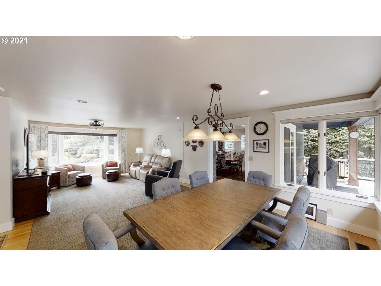 555 River Loop 1 Eugene, OR 97404 - Photo 7 of 28 a living room with furniture window and wooden floor