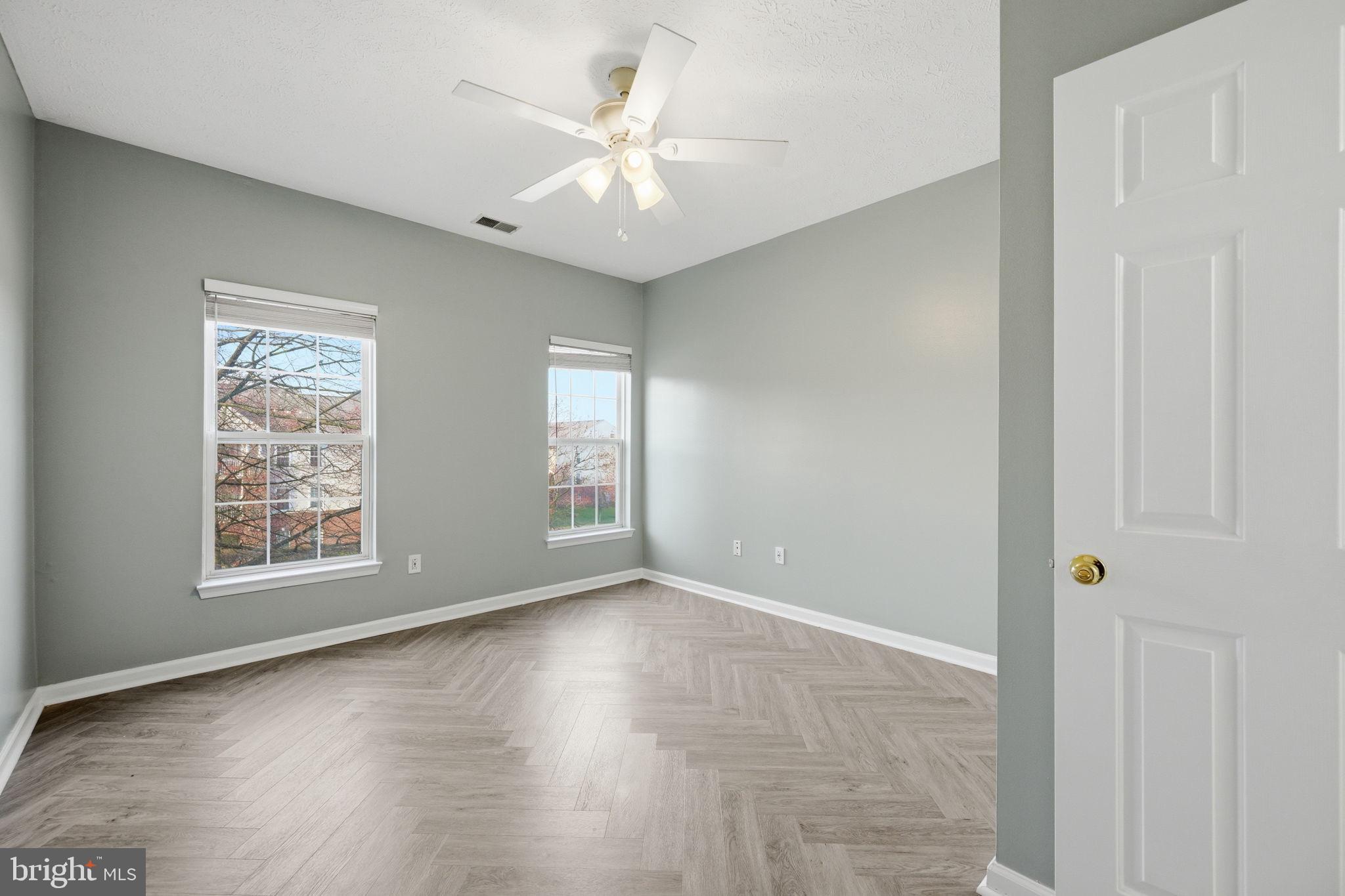 2402 Chestnut Terrace Court, Unit 202 Odenton, MD 21113 - Photo 12 of 24 a view of an empty room with a window
