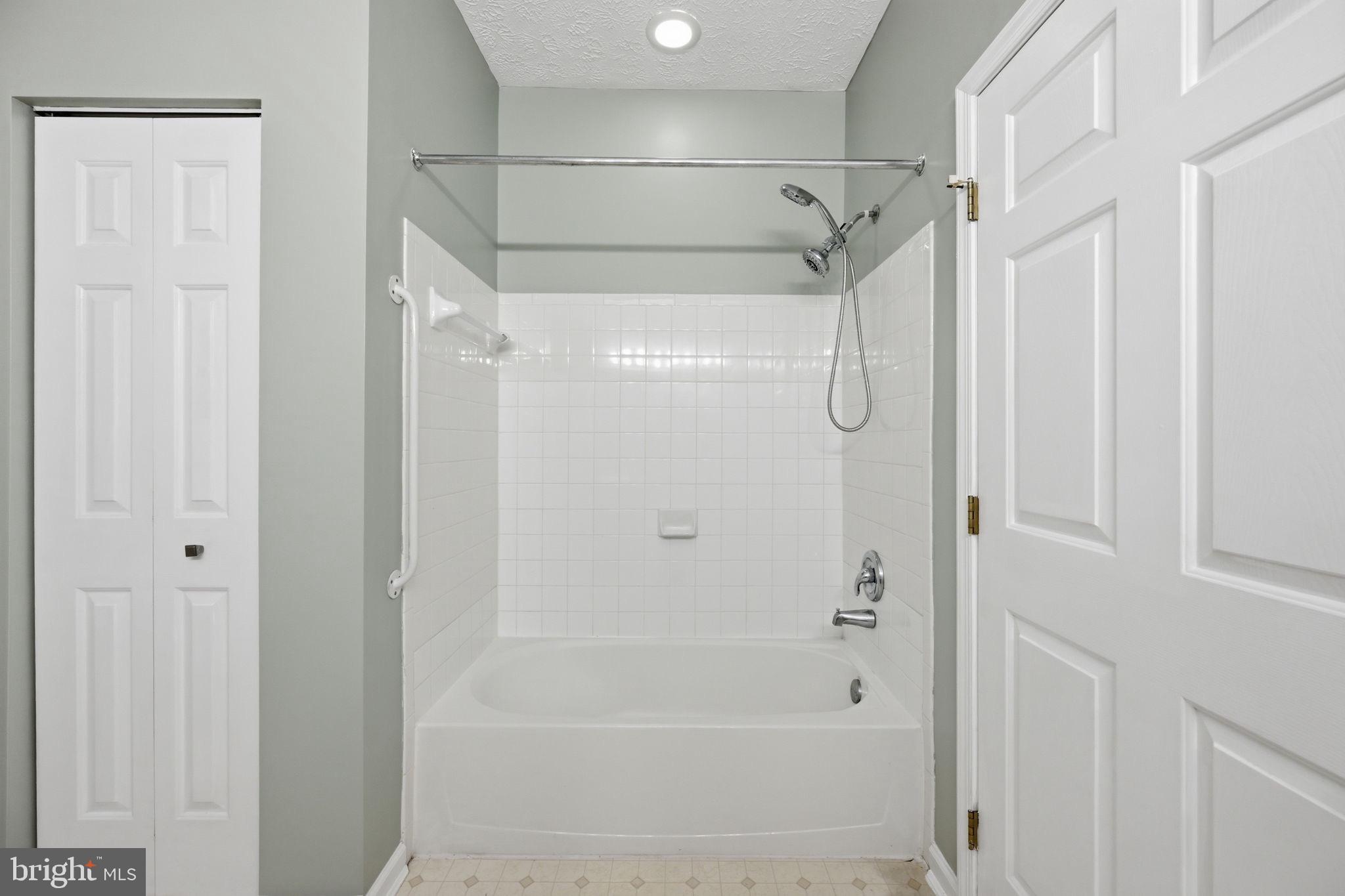 2402 Chestnut Terrace Court, Unit 202 Odenton, MD 21113 - Photo 17 of 24 a bathroom with a shower