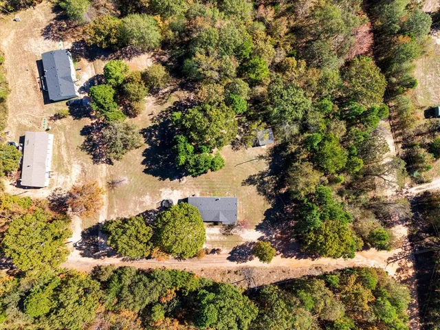 an aerial view of residential house with outdoor space