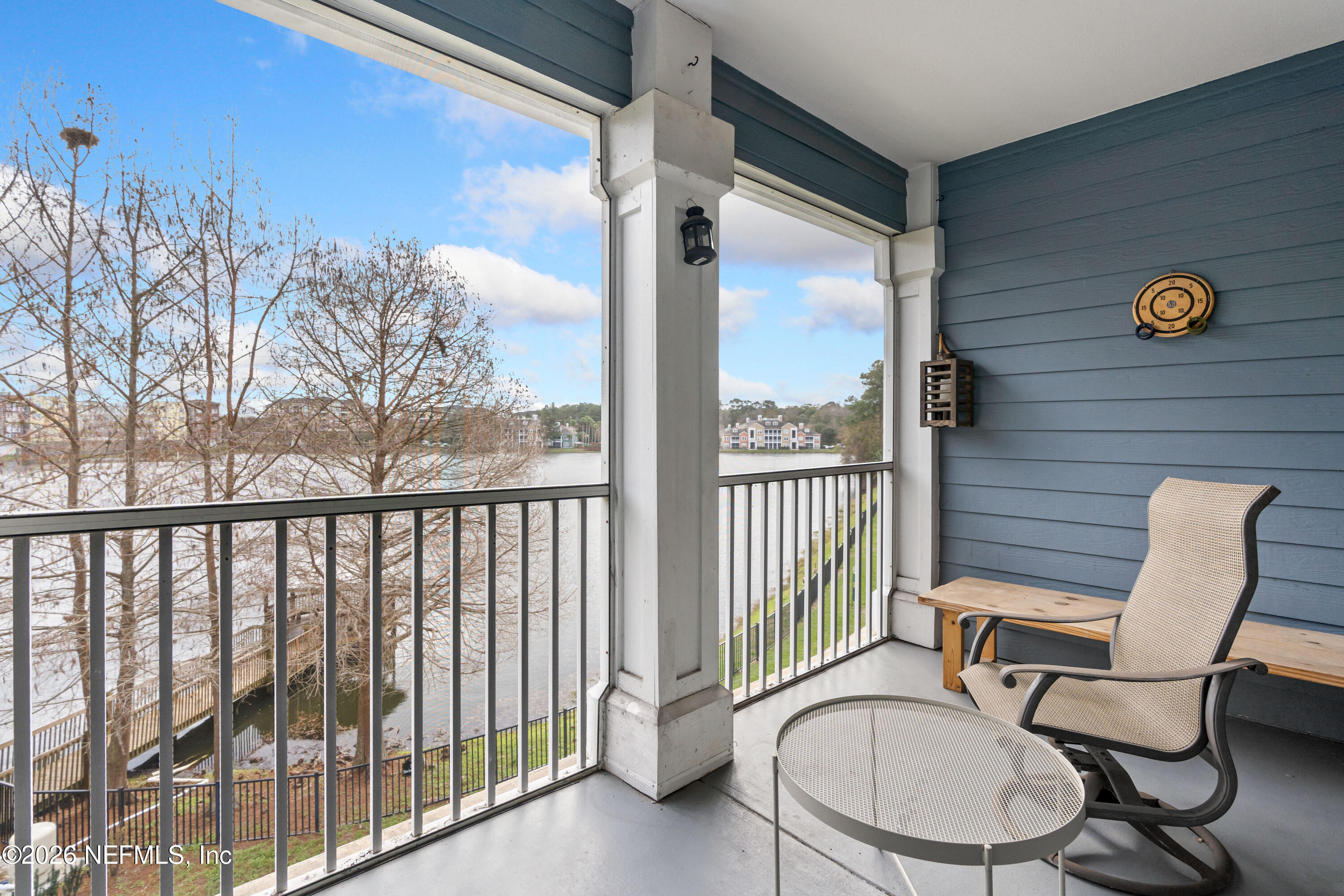 a view of a balcony with chairs