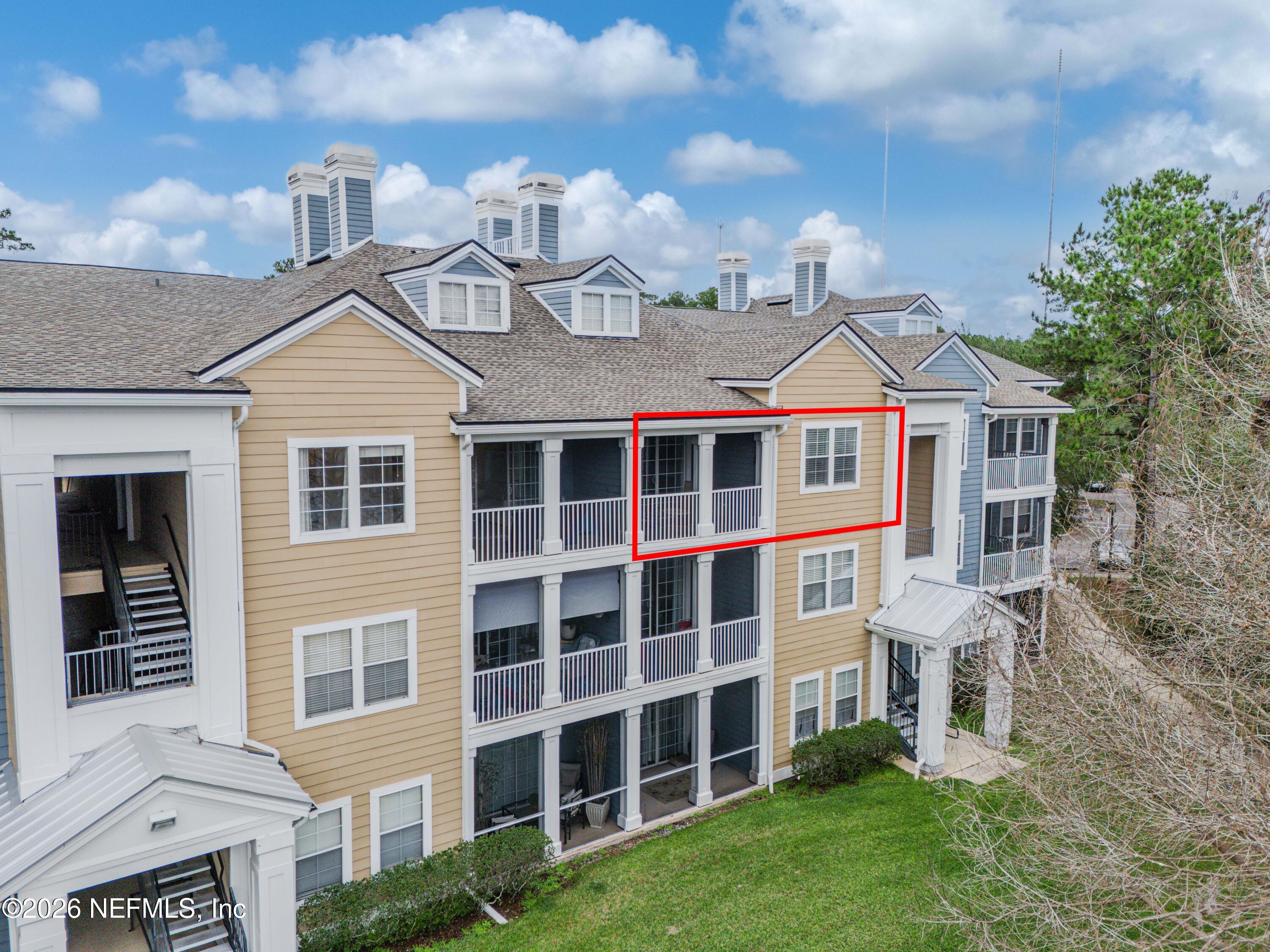 8550 Touchton Road, Unit 1034 Jacksonville, FL 32216 - Photo 28 of 30 a front view of a house with a yard