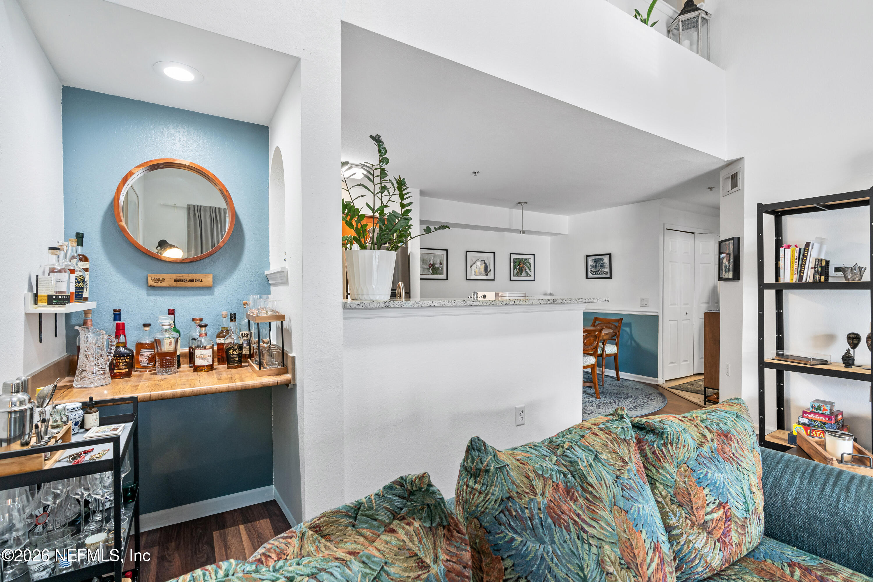 8550 Touchton Road, Unit 1034 Jacksonville, FL 32216 - Photo 10 of 30 a bedroom with bed and a mirror