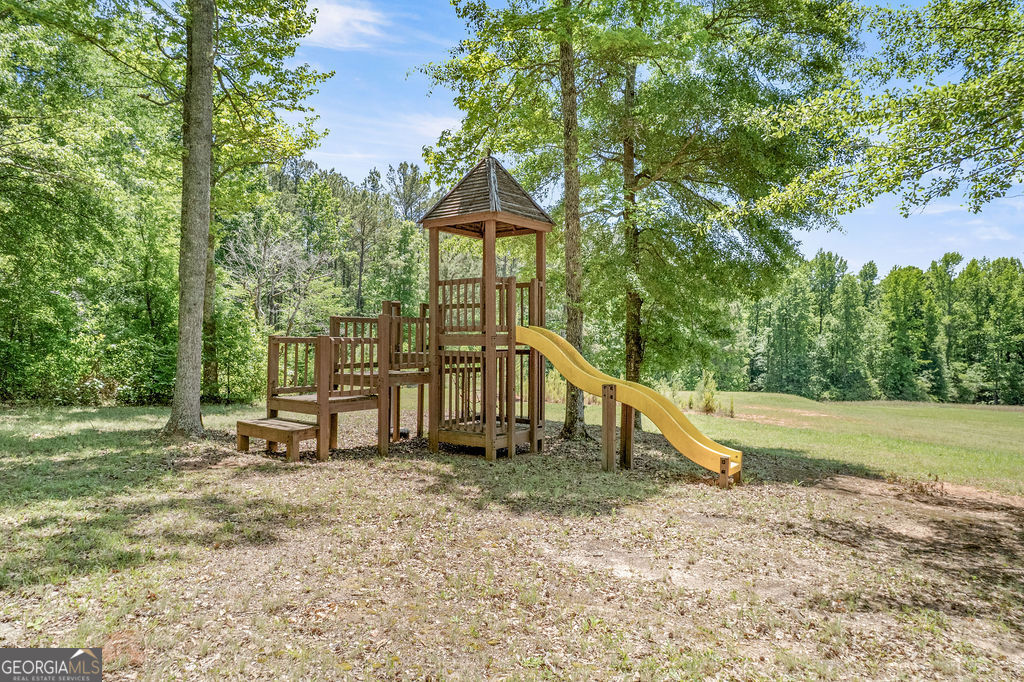 230 Haynes Road Moreland, GA 30259 - Photo 31 of 38 a view of a house with a yard