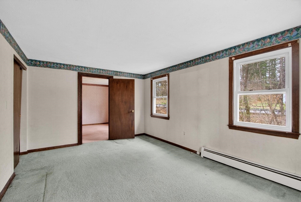 73 Nashua Road Pepperell, MA 01463 - Photo 15 of 33 an empty room with windows