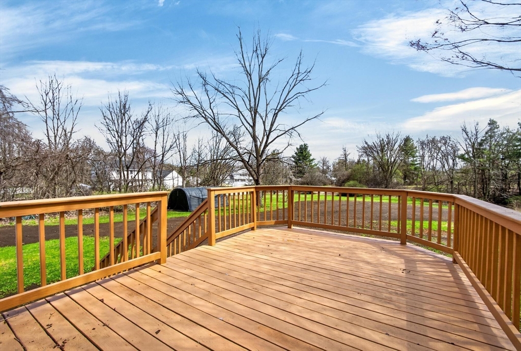73 Nashua Road Pepperell, MA 01463 - Photo 22 of 33 a view of balcony with wooden floor and fence