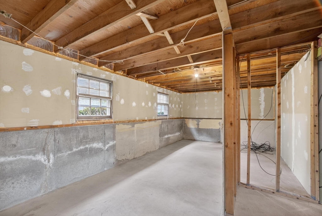 73 Nashua Road Pepperell, MA 01463 - Photo 24 of 33 a view of a room with racks on the wall