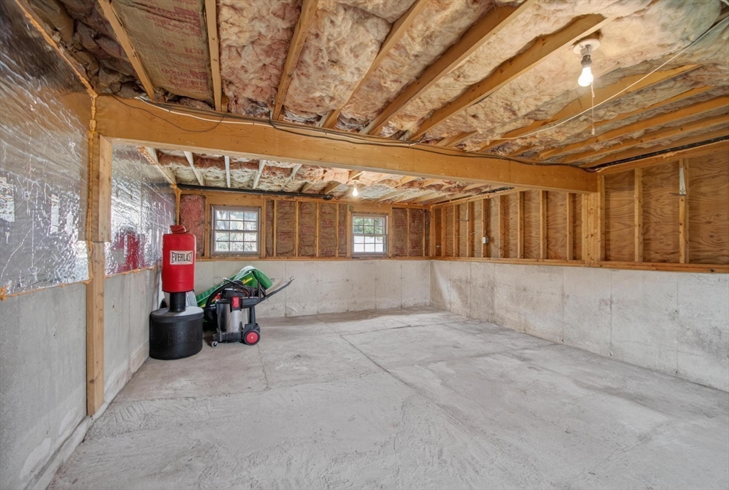 73 Nashua Road Pepperell, MA 01463 - Photo 26 of 33 a view of a couch in garage