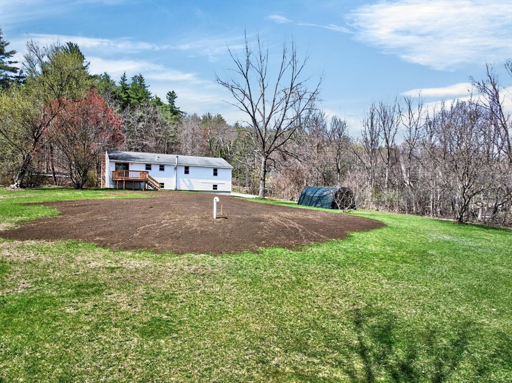 73 Nashua Road Pepperell, MA 01463 - Photo 29 of 33 a view of a house with a yard