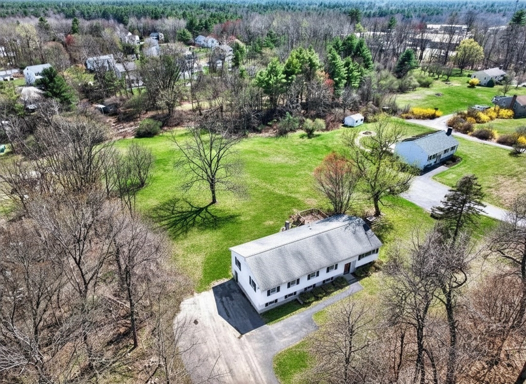 73 Nashua Road Pepperell, MA 01463 - Photo 31 of 33 a view of a yard with plants