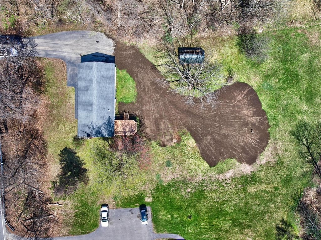 73 Nashua Road Pepperell, MA 01463 - Photo 32 of 33 an aerial view of a house with a yard