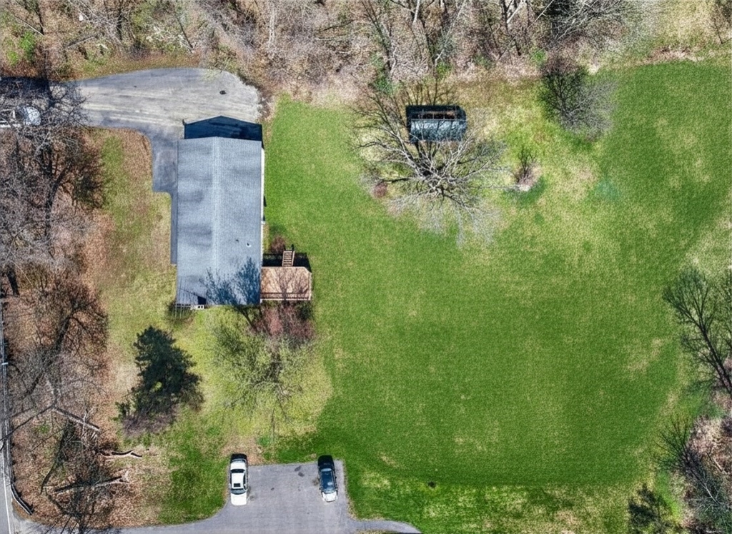 73 Nashua Road Pepperell, MA 01463 - Photo 33 of 33 a aerial view of a house with a yard