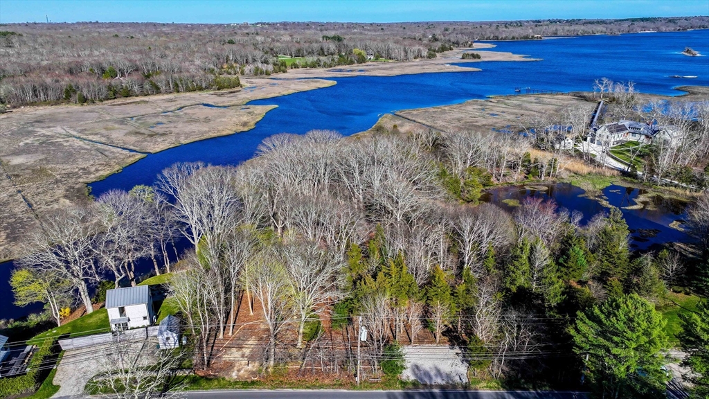 44 Old Harbor Road Westport, MA 02790 - Photo 4 of 26 a view of a lake with a mountain and trees