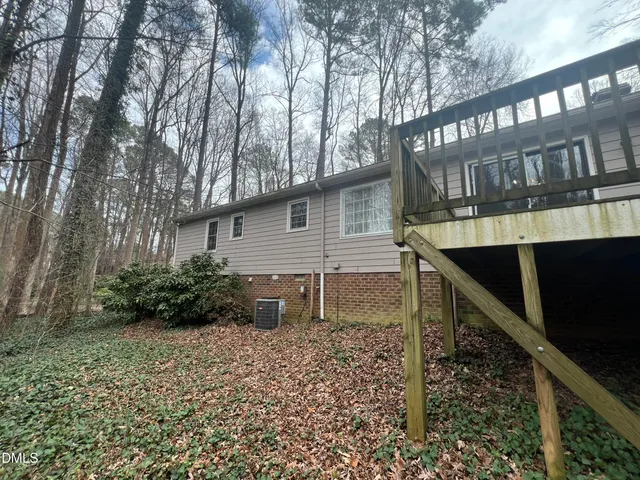 a house view with a backyard space