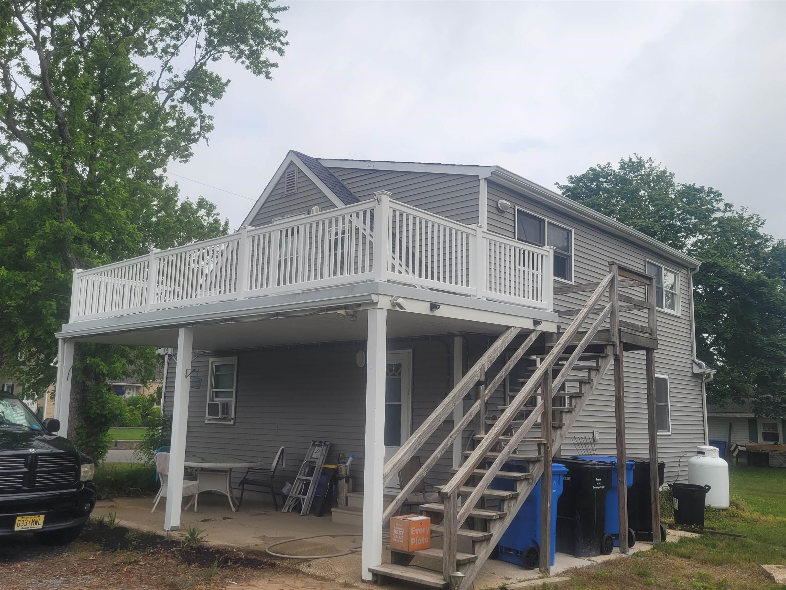 33 Stanhope Road Marmora, NJ 08223 - Photo 16 of 22 a front view of a house with stairs