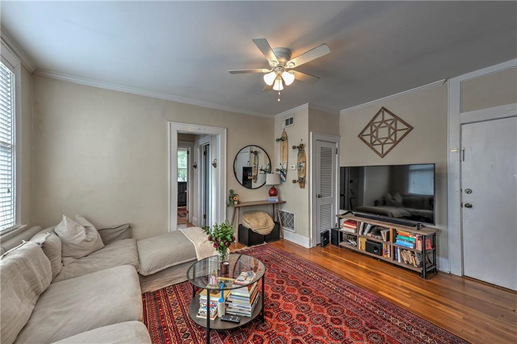 733 Frederica Street Northeast, Unit 2 Atlanta, GA 30306 - Photo 6 of 11 a living room with furniture and a flat screen tv