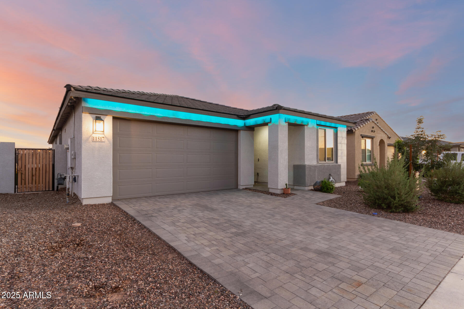 11517 East Unity Avenue Mesa, AZ 85212 - Photo 3 of 48 a front view of house with yard and garage