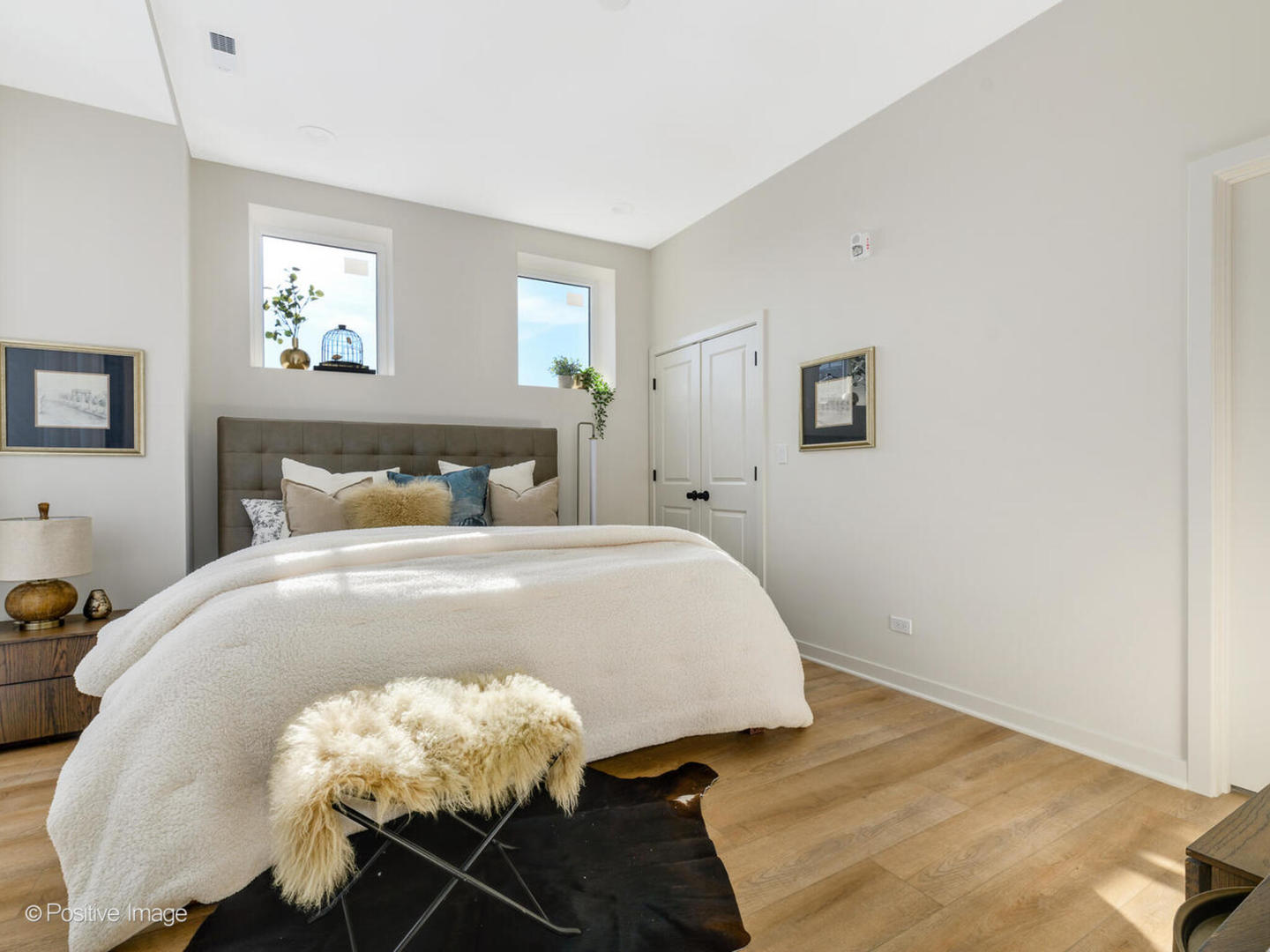 8324 Center Street, Unit 203 River Grove, IL 60171 - Photo 12 of 19 a bedroom with a bed and a chandelier