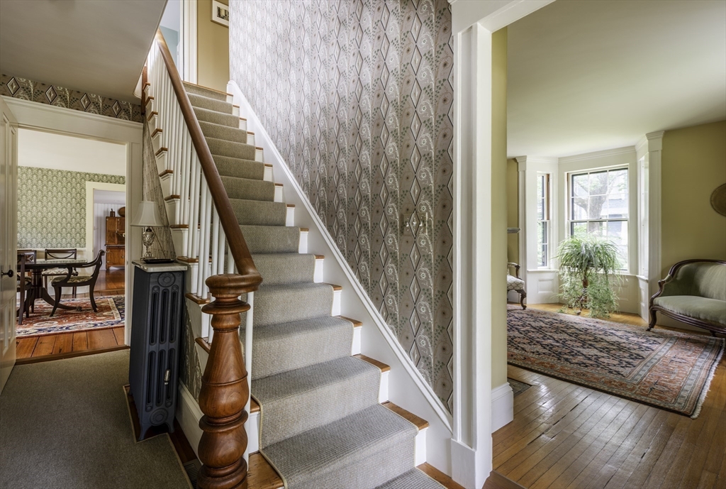 43 Middle Street Concord, MA 01742 - Photo 17 of 27 a view of entryway and hall with wooden floor
