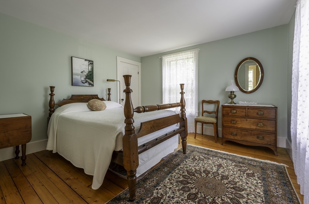 43 Middle Street Concord, MA 01742 - Photo 20 of 27 a bedroom with a bed and a cabinets