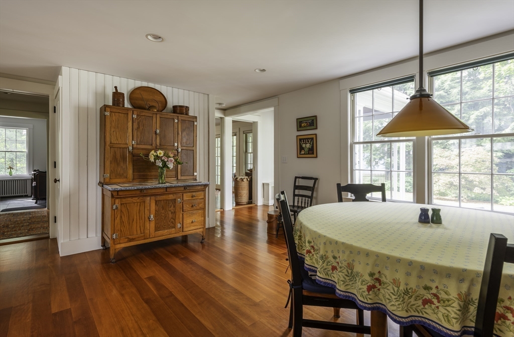 43 Middle Street Concord, MA 01742 - Photo 8 of 27 a living room with furniture a table and a large window