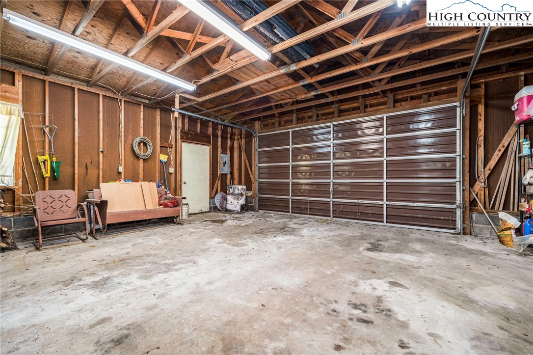 424 Poga Road Butler, TN 37640 - Photo 40 of 40 a view of a room with wooden walls