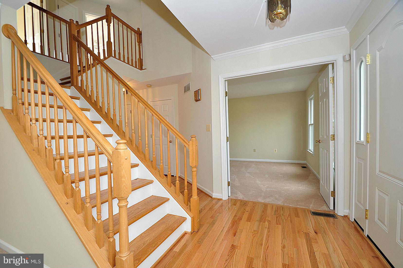 2711 Dunleer Road Ellicott City, MD 21042 - Photo 3 of 30 Open 2 story foyer w view of den/library