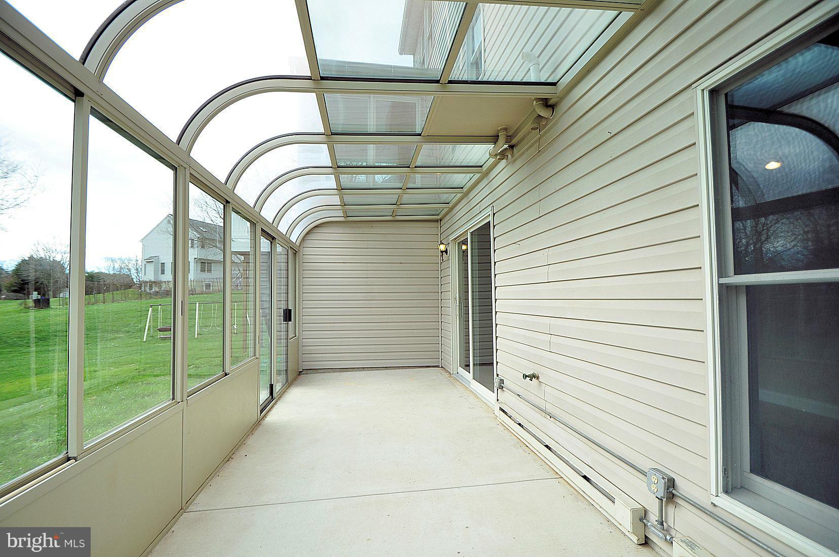 2711 Dunleer Road Ellicott City, MD 21042 - Photo 28 of 30 Glass sun room off rec room
