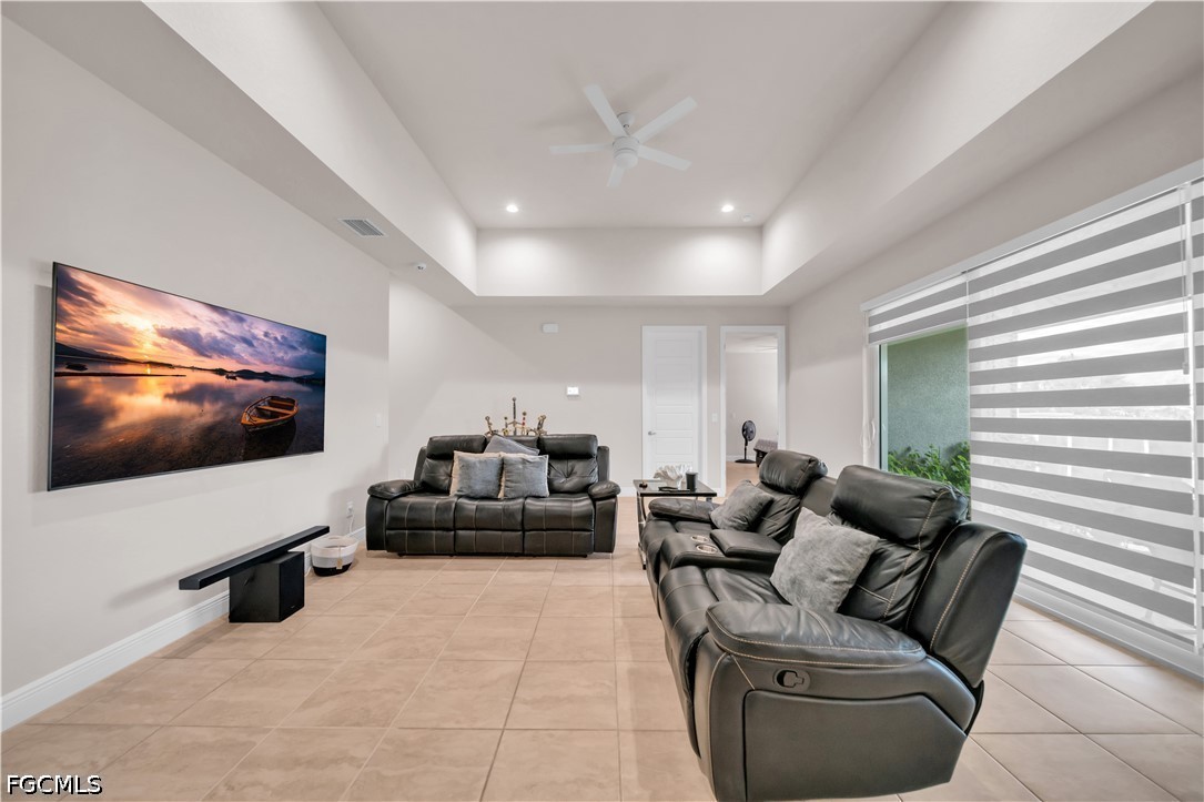 384 Neighborly Road LaBelle, FL 33935 - Photo 9 of 45 a living room with furniture and a flat screen tv