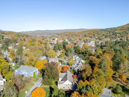 an aerial view of residential house with outdoor space