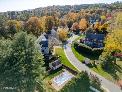 an aerial view of a house with a garden