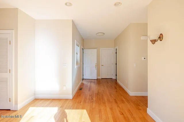 a view of a livingroom with wooden floor