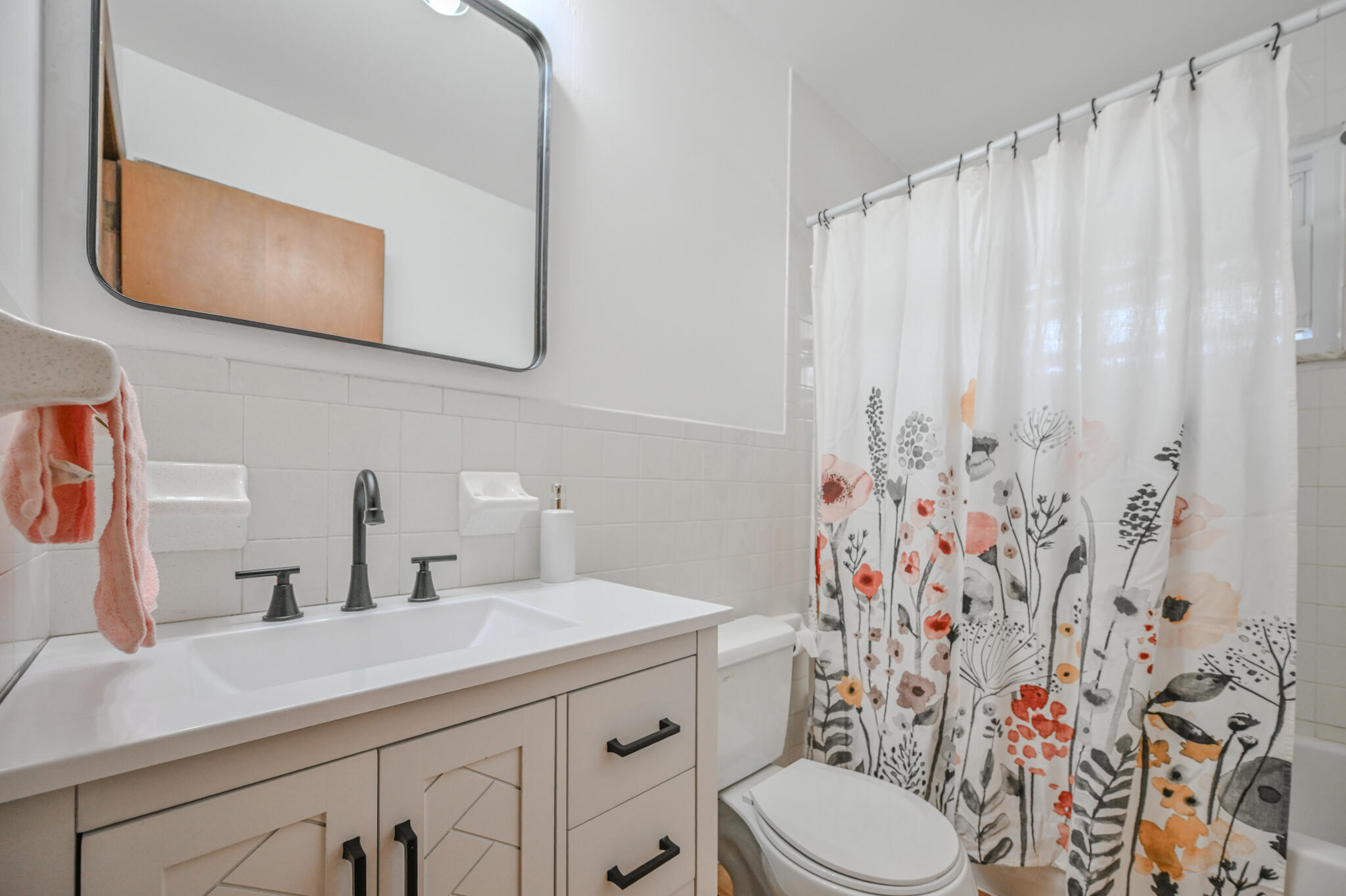 557 Vale Road Springfield, OH 45504 - Photo 33 of 54 Updated vanity, mirror and LVP flooring.