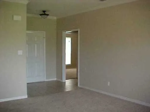 a kitchen with a stove and a microwave