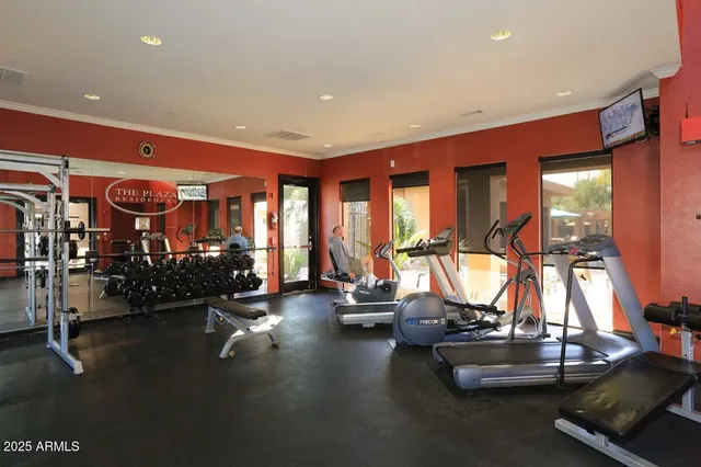 a view of a room with gym equipment
