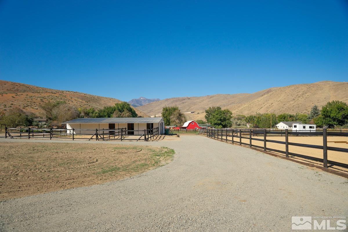 215 Neilson Road Reno, NV 89521 - Photo 26 of 40 a view of a terrace with a yard