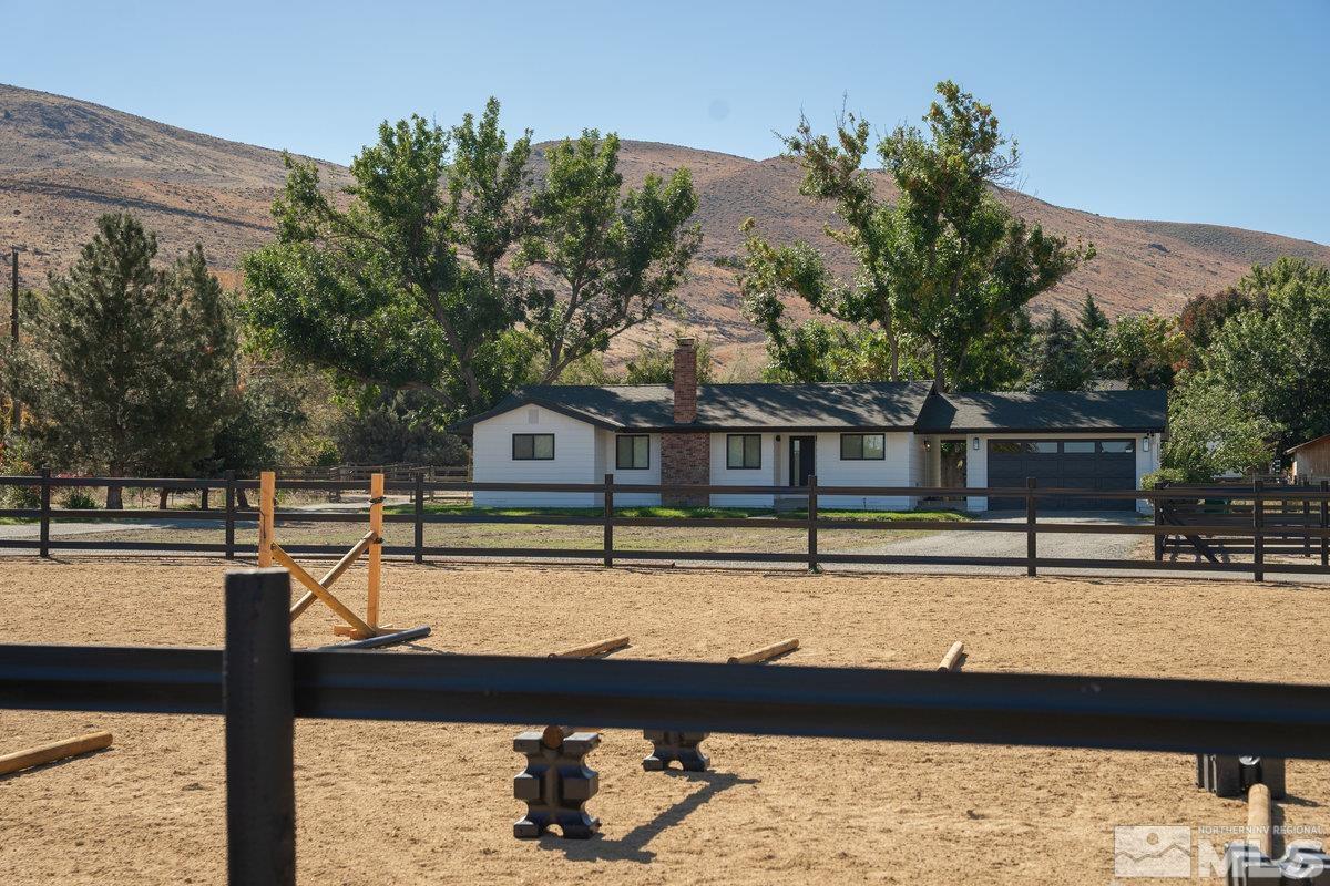 215 Neilson Road Reno, NV 89521 - Photo 35 of 40 a view of a swimming pool with a deck