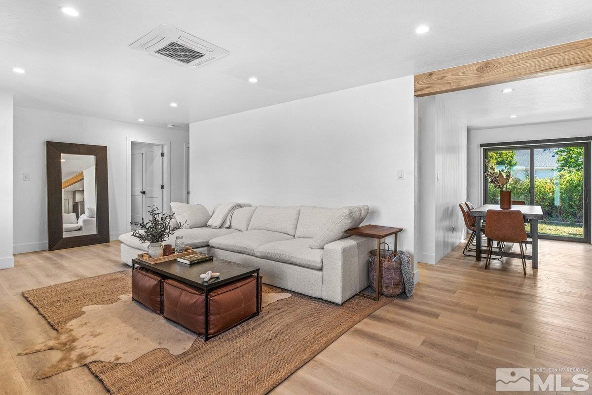 215 Neilson Road Reno, NV 89521 - Photo 4 of 40 a living room with furniture and wooden floor