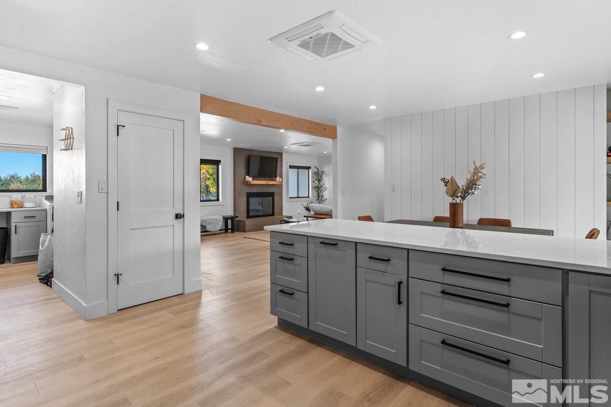 215 Neilson Road Reno, NV 89521 - Photo 8 of 40 a spacious bathroom with a double vanity sink and a mirror
