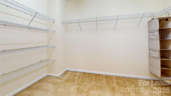 a view of a room with racks on the wall