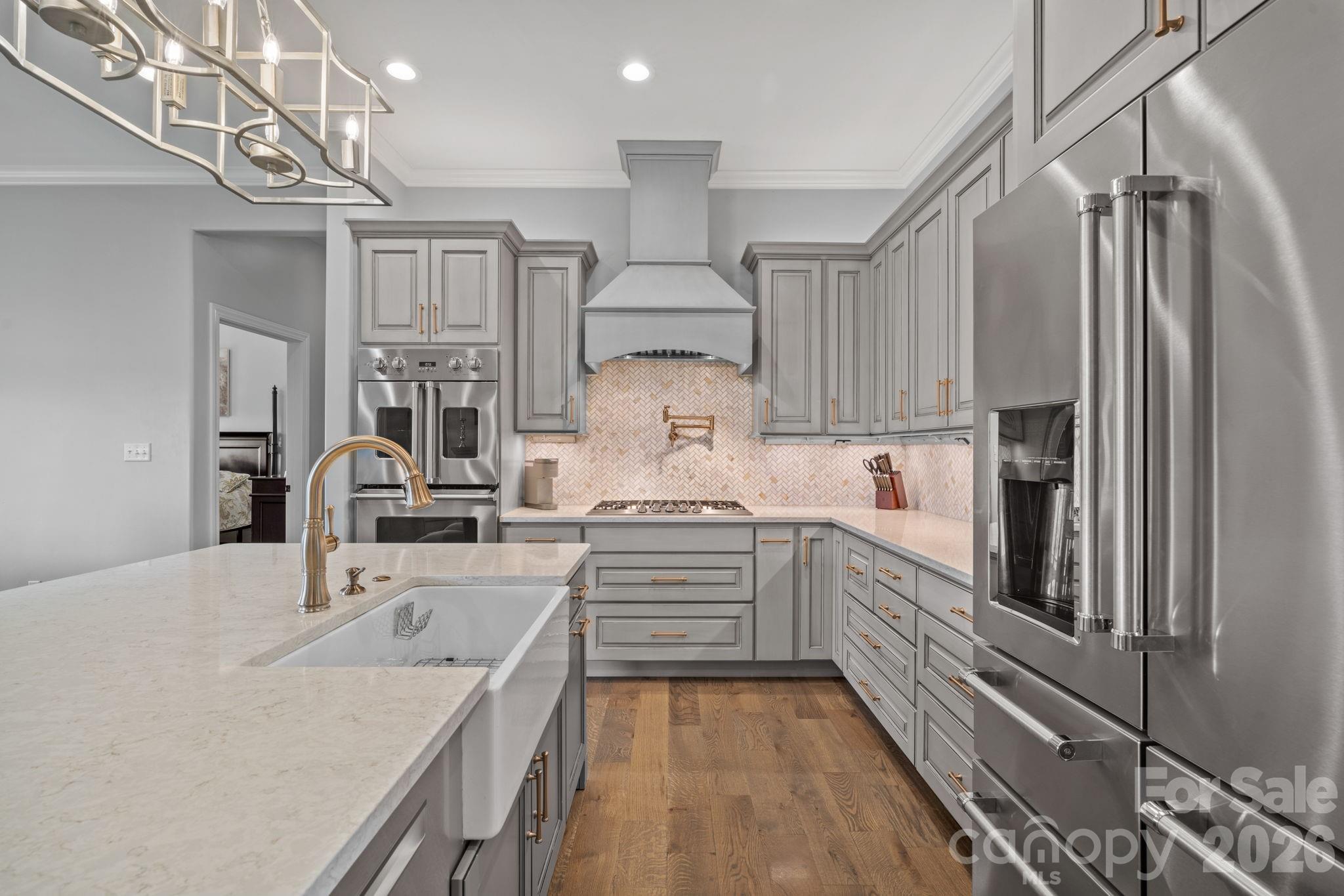 64 Waterhill Way Fletcher, NC 28732 - Photo 11 of 48 a kitchen with granite countertop a sink stainless steel appliances and cabinets