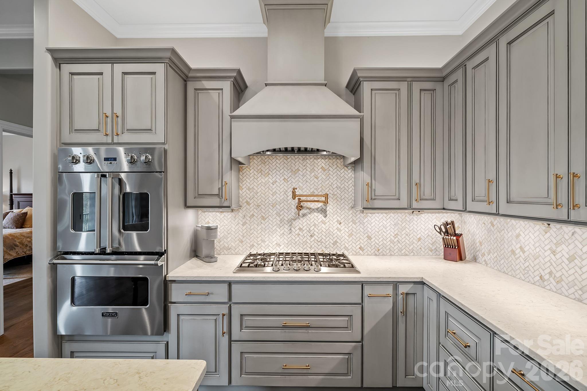 64 Waterhill Way Fletcher, NC 28732 - Photo 12 of 48 a kitchen with stainless steel appliances granite countertop a sink and cabinets