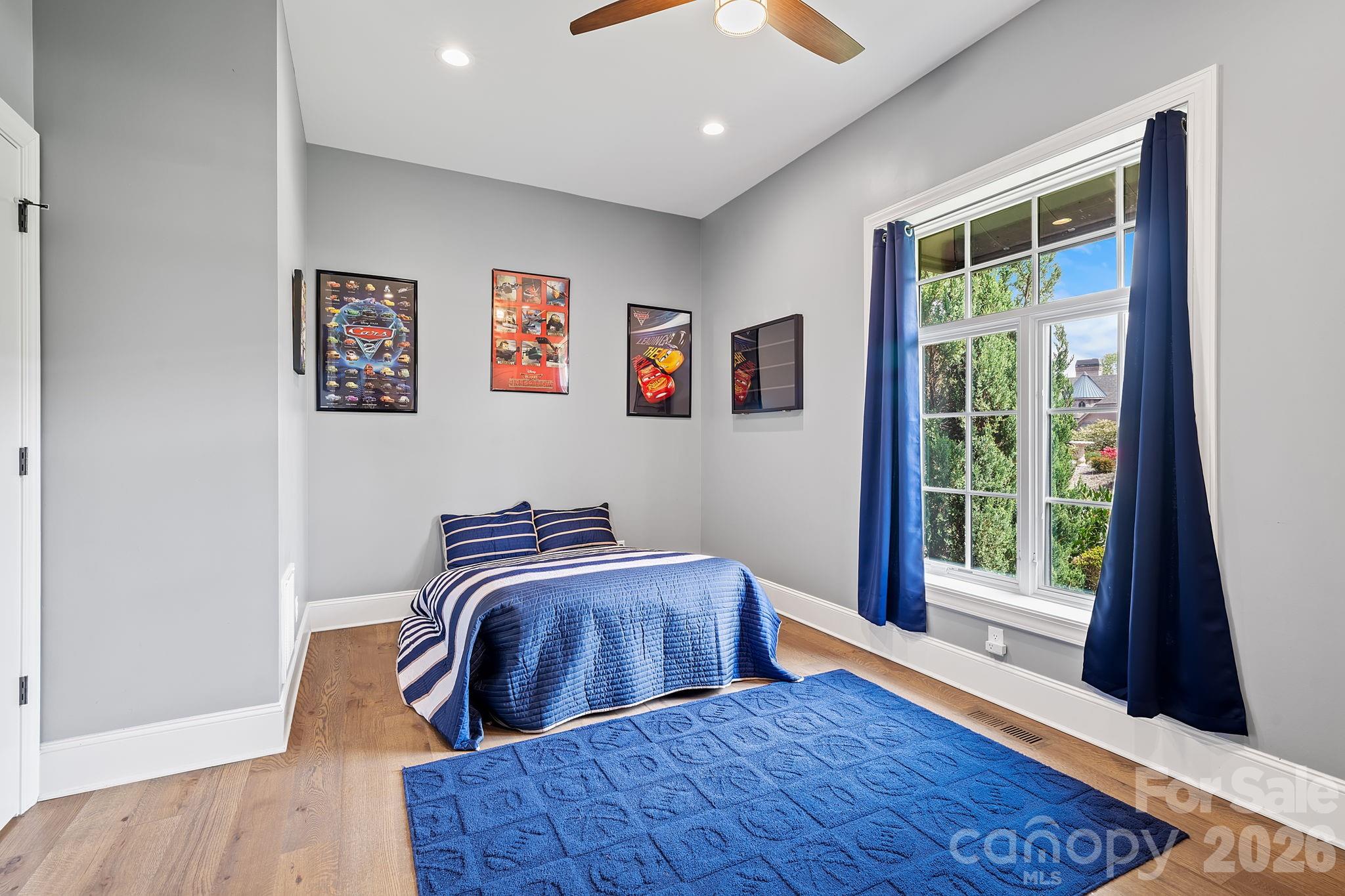 64 Waterhill Way Fletcher, NC 28732 - Photo 23 of 48 a view of a bedroom with window and hardwood floor
