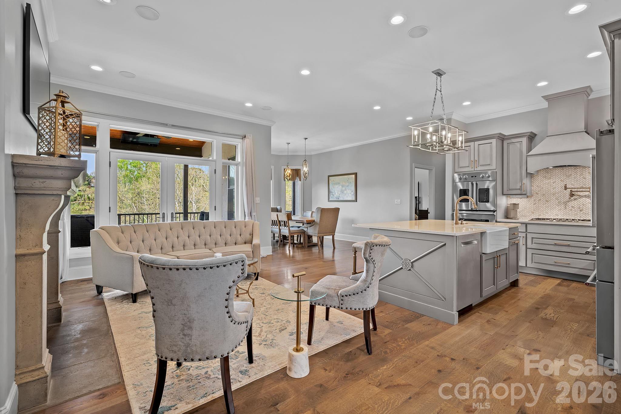64 Waterhill Way Fletcher, NC 28732 - Photo 6 of 48 a view of a dining room with furniture large window and wooden floor