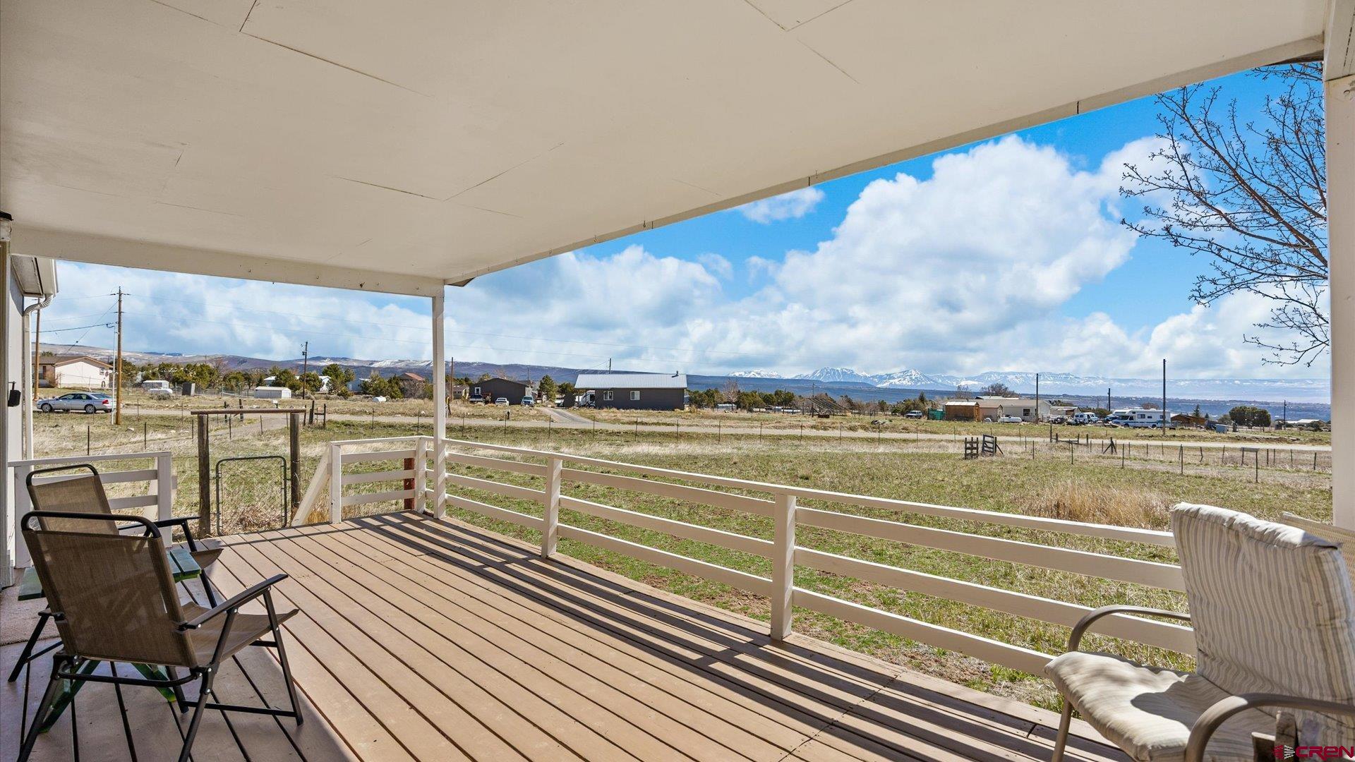 17177 Meadow Drive Cedaredge, CO 81413 - Photo 4 of 30 a view of a swimming pool with outdoor seating space